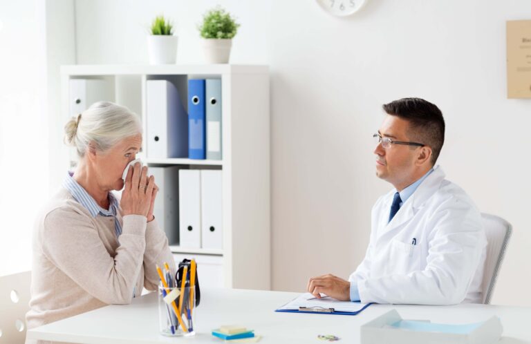 A doctor consulting with a patient about allergy symptoms.