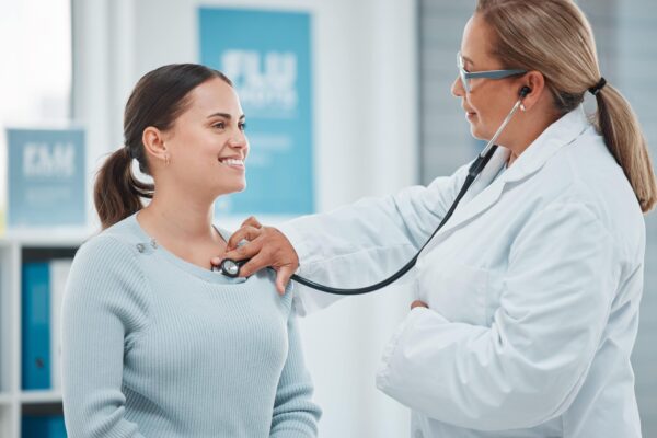 shot-of-a-doctor-examining-a-patient-with-a-stetho