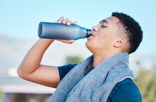 Drinking water, fitness and tired man training