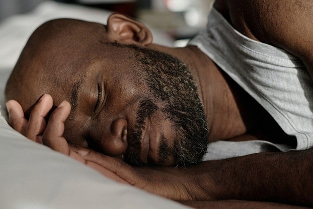 black man having a good sleep