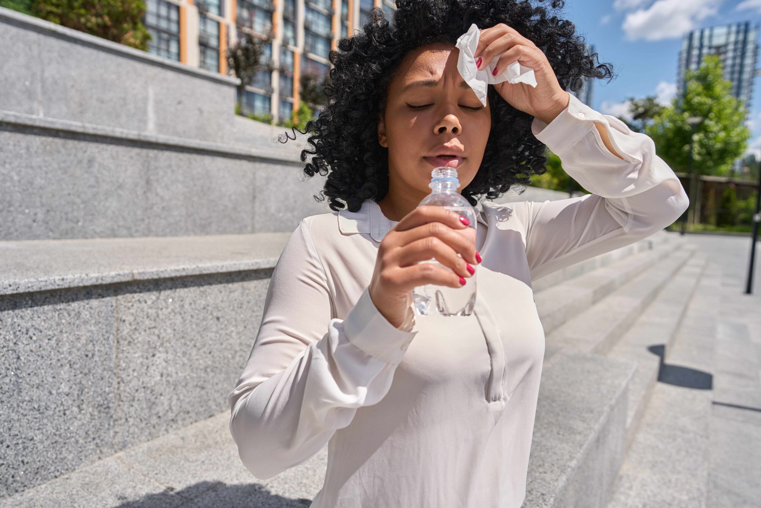 A woman cooling off in the city's heat.